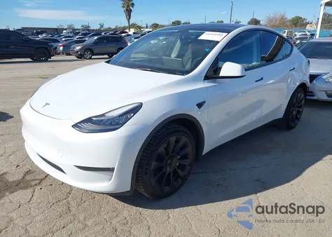 2023 Tesla Model Y Awd/Long Range Dual Motor All-Wheel Drive z USA, uszkodzony, nr VIN 7SAYGDEE2PA051411